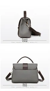 Detail view of woven gray texture with dark brown leather straps and gold metal hardware