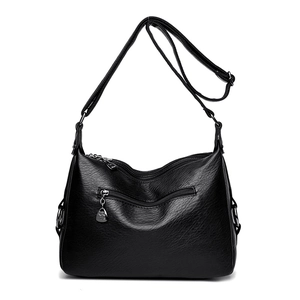 Classic black textured leather shoulder bag with multi-zipper layers and adjustable strap