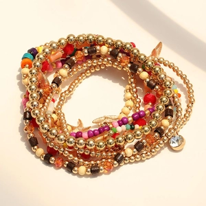 Conjunto de tobilleras bohemias multicapa con cuentas de colores y dijes de estrella