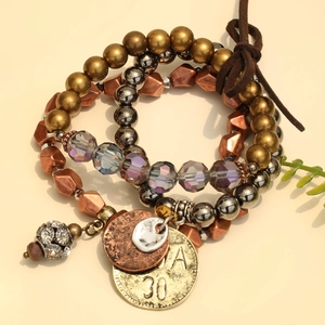 Bohemian multi-layer beaded bracelet set with crystal charms and vintage coin detail