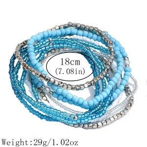 Detail of blue Bohemian beaded bracelet set showing elastic cords and 18cm circumference