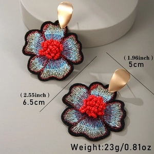 Handmade embroidered floral drop earrings with red beads and blue silver gradient petals
