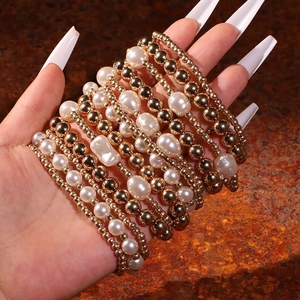 Set of 13 minimalist beaded bracelets with faux pearls and gold beads for beach style
