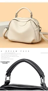 Detail der Handtasche mit Litschimuster-Leder, bequemem Griff und Silberbeschlägen
