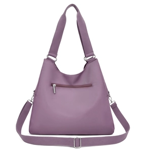 Large capacity purple waterproof nylon tote bag with adjustable shoulder strap and silver hardware