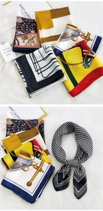Close-up of printed silk scarves featuring vintage equestrian and floral patterns