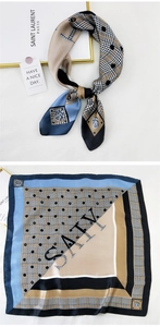 Detail view of square silk scarf with houndstooth pattern and geometric color blocking