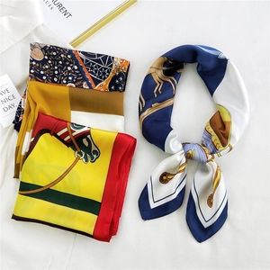Silk scarf with equestrian horse prints and vibrant geometric patterns for neck styling