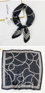 Detail of black silk scarf with white pearl dot patterns and fine rolled edge stitching