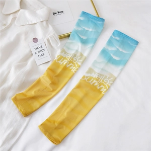 Detail of gradient blue and yellow ice silk sun protection sleeves with Hello Summer print