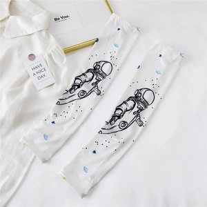 Detail of white ice silk sun sleeves with astronaut and planet space theme prints