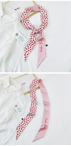 Close-up of strawberry print silk twilly with Positive Thinking embroidery detail