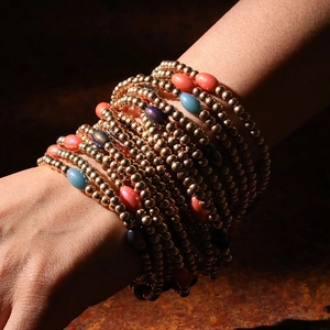 Handmade woven gold beaded bracelet set with colorful resin oval beads for women