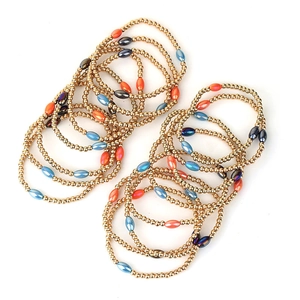 Bohemian CCB bead bracelet set with gold metal and multi-color accents on white background