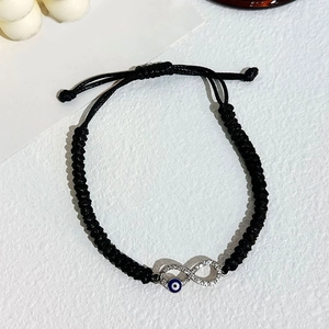 Handmade black woven infinity bracelet with blue evil eye and sparkling crystals for women