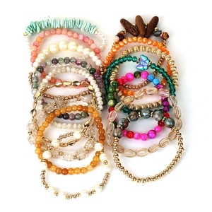 Set of 16 Bohemian stretch beaded bracelets with colorful stones and butterfly pendants