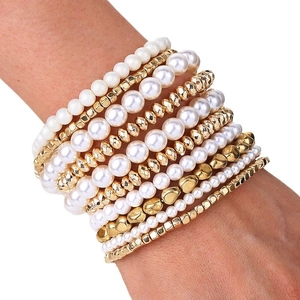 Fashionable 10-piece faux pearl beaded stretch bracelet set in elegant white and gold tones