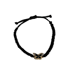 Handmade black cord bracelet with a gold butterfly charm and sparkling crystal accents