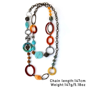 Detail showing 147cm bohemian long sweater necklace with turquoise beads and wood rings