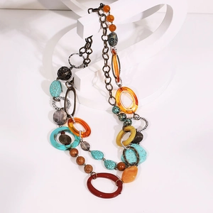 Long multi-layer bohemian statement necklace with turquoise beads and resin rings