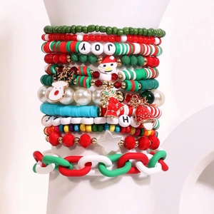 12-piece Christmas star and bead bracelet set with festive charms in red, green, and white