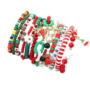 12-piece Christmas stackable bead bracelet set with festive star and bell charms