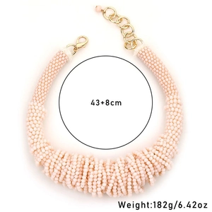 Detail of beaded peach pink crystal choker with golden lobster clasp and 43+8cm chain