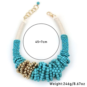 Detail of bohemian turquoise beaded chunky necklace with 45+7cm length and lobster clasp