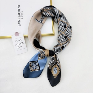 Stylish houndstooth and polka dot silk-like neck scarf with geometric patterns