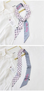 Detailed view of silk twilly scarf featuring dragon fruit print and Positive Thinking text