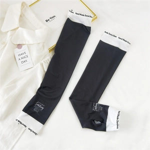 Detail of ice silk cooling sleeves featuring thumb holes and stylish text print