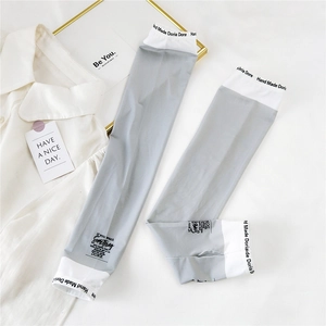 Detail of grey ice silk arm sleeves with thumb holes and stylish letter print design