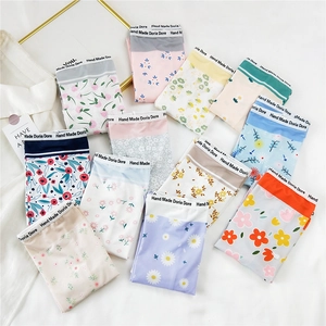 Lot de 12 culottes en coton pour femmes avec imprimés floraux marguerites et tulipes