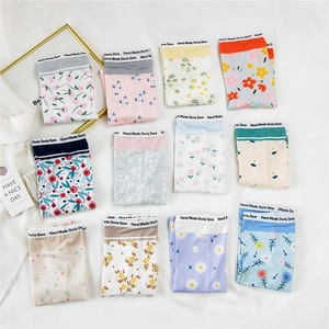 Détails de culottes en coton à imprimé fleuri avec taille élastique brodée