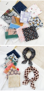 Detail of assorted linen cotton scarves with floral, fruit and geometric prints