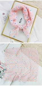 Detail of light pink floral cotton linen scarf with blue dots and LOVE pattern