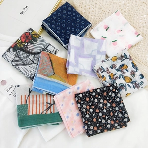 Various floral cotton linen square scarves with daisy and lemon prints for women