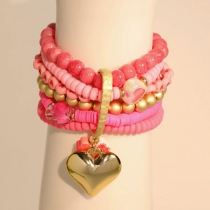 Multilayer bohemian pink beaded bracelet with heart pendant and soft clay tassels