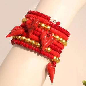 Bohemian multi-layer beaded bracelet featuring red heart charms and gold-tone accents