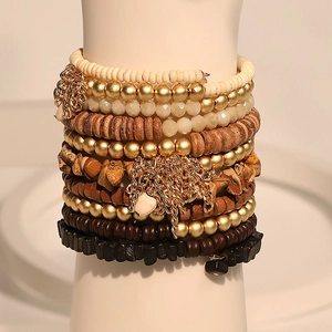 Bohemian multi-layer wrap bracelet featuring earth-tone beads and gold-tone chains