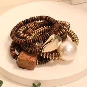 Bohemian multilayered bead bracelet set with wood, gold accents and a white pearl