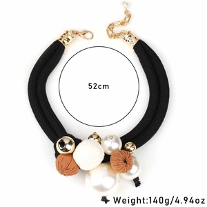 Detail view of chunky double-layer necklace with faux pearls and size 52cm 140g specs