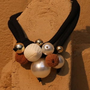 Bohemian double-layer necklace with black braided rope, pearls, and metallic beads