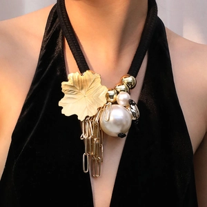 Bohemian maple leaf fringe necklace with faux pearls and gold leaf charm on black rope