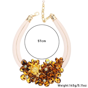 Detail of amber acrylic flower necklace with dual strands and 145g weight specs