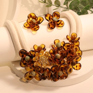Amber acrylic flower layered necklace and earrings set with gold metal accents
