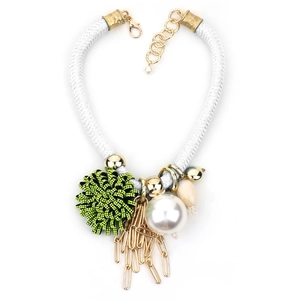 Green woven ball and pearl floral necklace with golden chain tassels on white cord