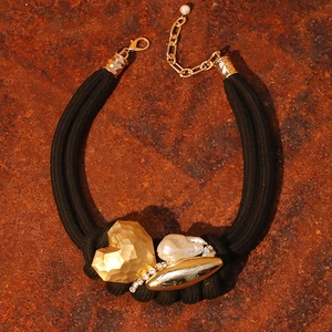Double-layer black rope necklace with gold textured heart, pearl, and rhinestone pendant