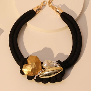 Double-layered black cord necklace with golden hammered heart and baroque pearl pendant