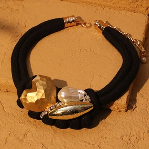 Bohemian double-layer choker with heart pendant, baroque pearl, and gold accents on stone